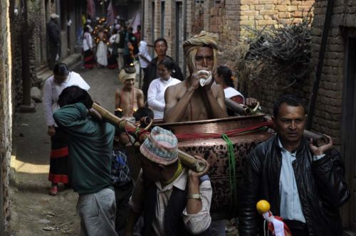 SEASON'S END: Locals of Thecho, a village in the southern side of Kathmandu Valley, participate in an annual procession that marks the end of the month of Magh.