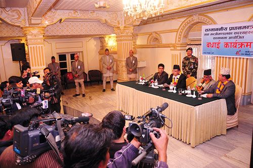 LIGHTS, CAMERA, ACTION!: Prime Minister Jhal Nath Khanal and his new men at a program organised by Press Chautari on Sunday to congratulate the new office bearers.