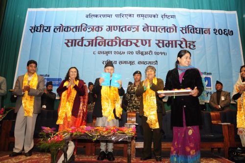 NEW CONSTITUTION, NOT: CA Speaker Subhas Nemwang unveils a prototype for the constitution of Nepal prepared by National Coliaton Against Racial Descrimination in the capital Sunday.