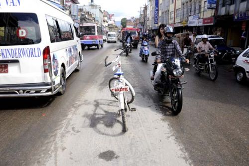 MOBILE ROAD DIVIDER: A traffic police bicycle appears to keep the vehicles on their respective lanes in Kumaripati.