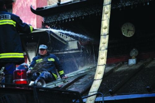 DODGE!: The Juddha Fire Brigade team gives Ajima temple in Ason, Kathmandu, a much needed spring clean, Friday. The cleaning took place on the initaiation of the local Machhindra Club.