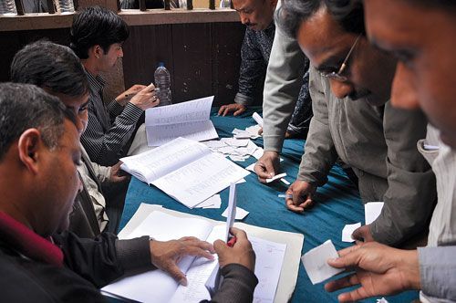 MY TURN: Voters line up outside Nepal Chamber of Commerce in Kantipath on Wednesday to elect new members for the Chamber's working committee.