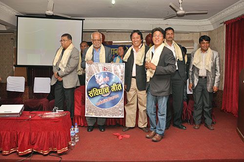SONG AND DANCE: The Indigenous Artistes' Organisation launch a collection of music videos on the constitution, with Constitutional Committee Chair Nilambar Acharya (second from left), Kamaladi, Saturday.