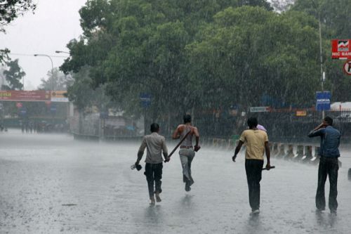 STORMED OUT: Strikers head home after torrential downpour disrupted the banda.