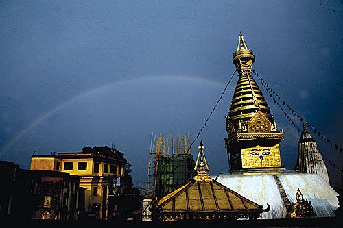 GOLDEN END: A rainbow arches over the Swayambhu Nath stupa after thunder showers on Wednesday.