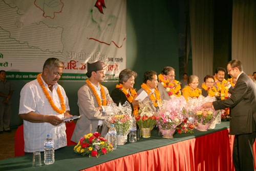 BOUQUETS AND GARLANDS: Candidates who won the elections from Kathmandu Valley are feted by Nabil Bank chief Anil Shah in a function organised by the Friends of the Bagmati on Monday. Maoist Chairman Pushpa Kamal Dahal was also present.