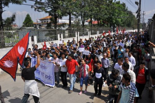 ABOUT TIME: Locals participate in a rally outside the BICC, Baneshwor, Kathmandu, on Saturday, demanding that the CA members take the responsiblity to write the constitution on time seriously.