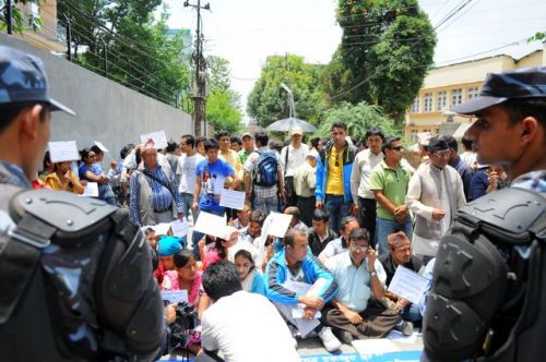 WHAT ABOUT US? Conflict victims stage a sit-in protest outside Singa Darbar on Monday. ar