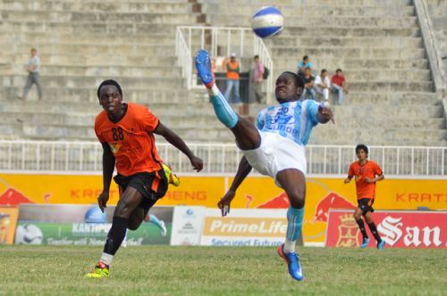KICK BACK: Anatole Thierry of Manang Marshyangdi Club attempts a score at the Martyrs Memorial A Division League at the Dasharath Stadium, Sunday. MMC won the game to the Himalayan Sherpa by 2-1.