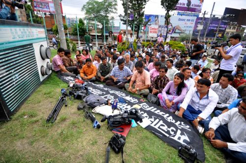 TUNE INTO US: Federation of Nepalese Journalists (FNJ) stages a sit-in protest at Maitighar Mandala on Wednesday, against attack on Biratnagar-based journalist Khil Nath Dhakal and other journalists. FNJ has demanded the arrest of Parshuram Basnet, the person behind the attack.