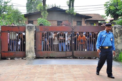 IRON GATE: Students stand outside the Exam Controller's Office in Sano Thimi, Bhaktapur, on Monday, awaiting the announcement of the results of the SLC examination. This year, 55.5 per cent of the examinees were able to clear the examination.