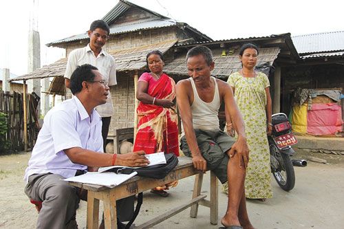 HEAD COUNT: Census enumerator Bhumi Lal Rajbanshi questions Sanju Lal Meche, a resident of Mechi Nagar, Jhapa, on Monday for the 11th National Census 2011. Over 46,000 enumerators have been deployed nationwide for the purpose.