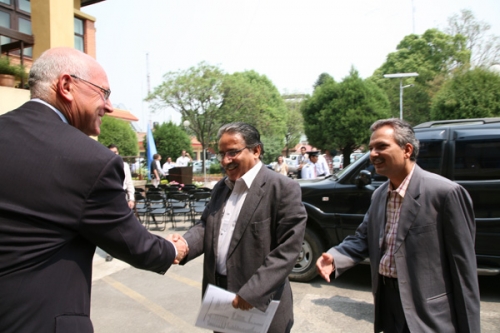 FIRM HANDSHAKE: UNMIN chief Ian Martin welcomes Pushpa Kamal Dahal and Baburam Bhattarai at the UN Complex in Pulchok on Thursday for a Maoist briefing of Kathmandu-based donor representatives.
