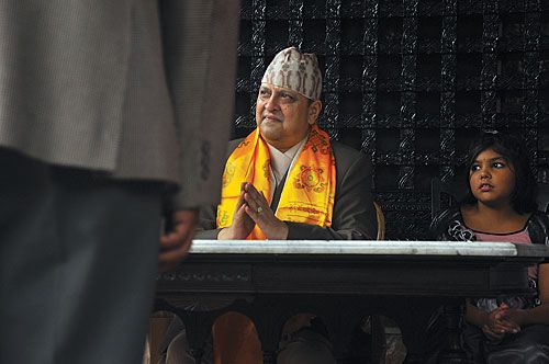 BIRTHDAY GLORY: With his eldest granddaughter Purnika Shah by his side, former king Gyanendra Shah awaits his well-wishers at the Shital Niwas, Maharajgunj, on the occasion of his 65th birthday, Thursday morning.