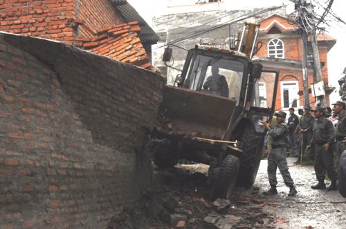 CLEARING: An illigally built house in Sankhamul, Kathmandu, being demolished by Kathmandu Metropolitan City Office on Wednesday.
