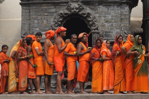 SAFFRON RUN: Devotees line up at the premises of Pashupatinath Temple while taking part in the annual 'Bol Bom' (Say Shiva) pilgrimage to Kathmandu on Monday. The devotees run 15 kms barefooted to reach the temple, seeking good health, wealth and happiness.