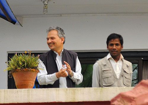 HAPPY CAMPER: Baburam Bhattarai heads out to the balcony after a Maoist CWC meeting at the party's headquarter at Paris Danda in Kathmandu on Saturday. The meeting proposed a reshuffled cabinet and new work division of party office bearers. Bhattarai was named prime ministerial candidate.