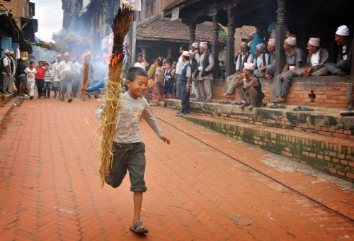 TIME TO RUN: A boy celebrating Ghantakarna festival. Its symbolize the destruction of evil while celebrating this festival in Bhaktapur on Friday. According to legend, the demon is believed to "steal" children and women from their homes and localities.