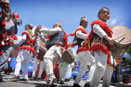 BEAT THE DRUM: Locals participate in a parade to celebrate 17th International Indigenous Day outside City Hall, Kathmandu, on Tuesday.