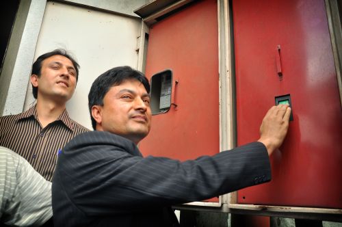 DISCONNECTED : Energy Minister Gokarna Bista, cutting power supply in Department of Roads, Babarmahal on Wednesday. The department has bill of Rs 760 thousand payable to Nepal Electricity Authority.