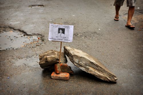 REST IN PEACE : Pam plate of Rosy Maharjan at Patan Dhoka, who was murder my Subash Upreti last week . Local announced Lalitpur Band today, due to band transportation, academic institutions, marketplaces were affected in Lalitpur.