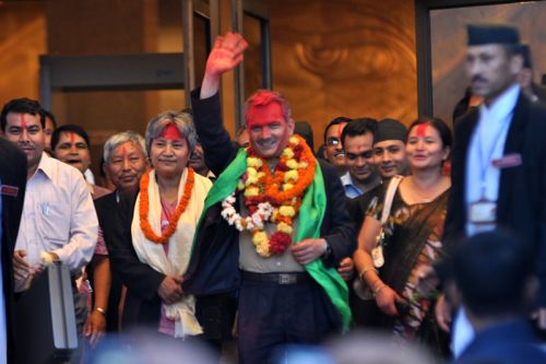 VICTORY WAVE:Newly elected prime minister Baburam Bhattarai heads out from the CA building. Bhattarai secured 340 of 575 votes cast on Sunday's prime ministerial election.