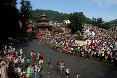 Nepali Devotees crowd at Gokarneshwor Mahadev temple on the occasion of Father's Day (Kushe Aunsi) on Monday. It is a tradition on this day for those who have lost their fathers to make shraddha on the banks of the Bagmati near the temple.
