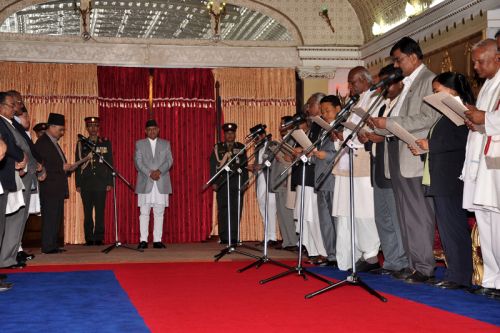 GETTING BIGGER: PM Baburam Bhattarai expand his Cabinet by inducting 13 new ministers from his party UCPN-Maoist and five constituent parties of United Democratic Front(UDMF) at Shital Newas on Sunday.