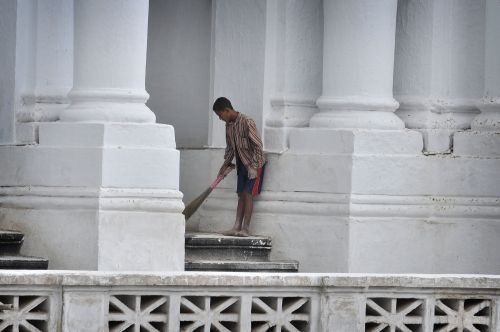 FACE-LIFT: A boy cleans up as the Hanuman Dhoka Palace, Basantapur, gets a fresh coat of paint on Tuesday.
