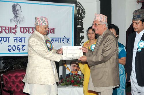 TIMELY HONOUR: President Ram Baran Yadav conferred the PP Prasai Foundation's Lifetime Achievement Award to tourism entrepreneur Tek Chandra Pokharel at Shital Nibas on Monday.