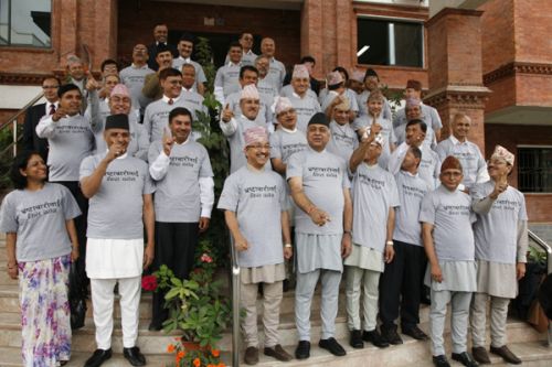 MAY THE CURRUPT ROT: Chief secretaries the state join in an anti-curruption campaign, wearing a 'May the corrupt rot' t-shirt outside the office of Commission for the Investigation of Abuse of Authority on Tuesday.