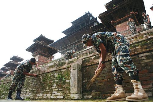 DASAIN AYO: Nepal Army cleans up the Taleju Temple, Basantapur, on Thursday, preparing it for Dasain, the only time in the year it is opened for public.