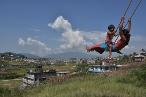 DASAIN SWING: Locals play traditional bamboo swing at Nakhipot, Laitpur on Wednesday.
