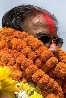 BREATHING SPACE: Locals overload Pushpa Kamal Dahal with garlands and cover him with tika when he arrives in Chobhar. He reiterated that the Maoists have overwhelming support in the country, and that election results will reflect that.