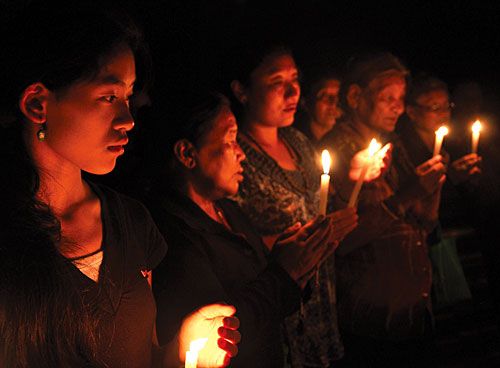 IN REMEMBERANCE: Tibetans light candles on Tuesday at the Tibetan Refugee Center in Lalitpur in memory of Tibetans in Sichuan who have died through self-immolation in oppositon of religious controls by the government.