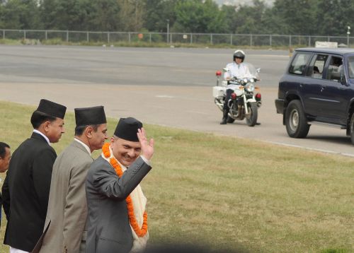 OFF I GO: Prime Minister Baburam Bhattarai bids farewell at the Tribhuwan International Airport as he heads towards his flight to Delhi on Thursday.