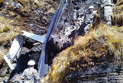 FATAL SKIES: A rescue team of the Nepal Army reaches Bobang, Baglung, the crash site of NA's RAN 49 Islander on Wednesday, a day after the aircraft went down, killing all six aboard.