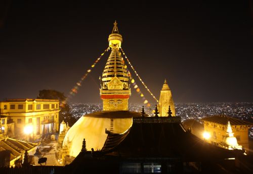 READY FOR THE NIGHT: The Swyambhu Temple lights up with Kathmandu city glowing on the backdrop for Laxmi puja on Wednesday.