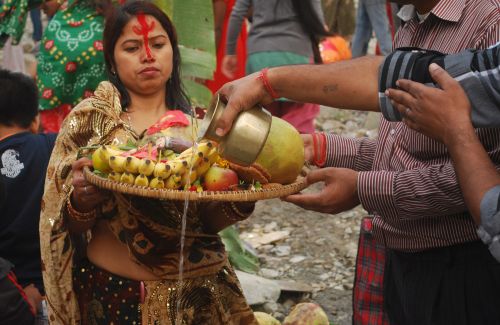 PRAYERS TO THE SUN: Prayers being offered in Sunsari on Tuesday evening in the holiest of the Tarai festivals, Chhat.