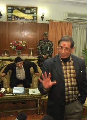 NO-NO: PM Baburam Bhattarai prepares to leave after signing the seven-point peace agreement as Maoist vice chairman Mohan Baidya talks to the press. The Baidya faction has opposed the deal saying it violates the party's principles.