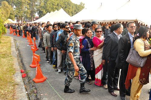 QUEUE FOR TEA: Invitees to a tea party at the prime minister's residence in Baluwatar on Tuesday line up to greet PM Baburam Bhattarai.