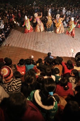 DIVINE DANCE: Spectators enjoy masked dancers performing Kartik Naach at the courtyard of Patan Darbar Square, Tuesday. The week long festival is held every year towards October-November and is believed to be started by King Siddhi Narshing Malla in the 17th century AD.