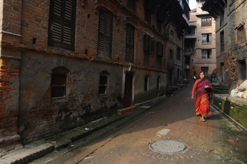 MORNING PRAYER: An elderly woman in Bhaktapur heads to a nearby temple for her daily prayer on Wednesday morning.