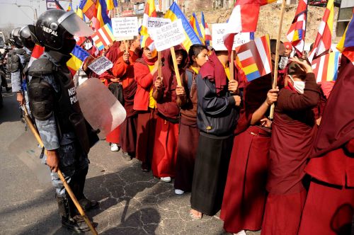 NO POLITICS: Buddhist monks and nuns protest at Maitighar, Kathmandu on Wednesday against the appointment of Maoist party chief Pushpa Kamal Dahal as the head of a Lumbini development project, demanding that there should be no political involvement in projects concerning Lumbini.
