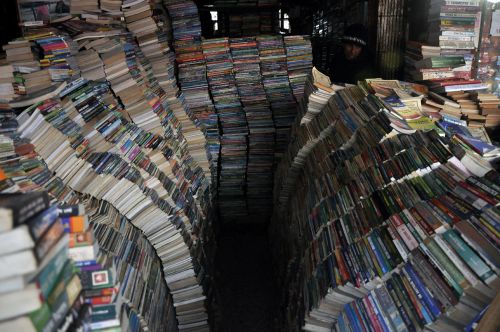 MOUNTAINS OF KNOWLEDGE: Books stacked in a second hand bookstore in Bhrikuti Mandap on Tuesday.