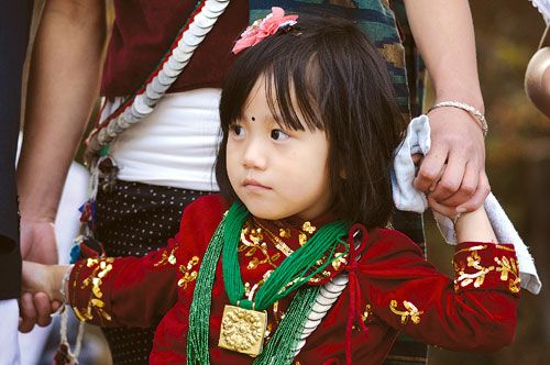 KIRAT CUTIE: A young girl at a gathering on Saturday to celebrate Udhauli, a Kirat festival that marks the begining of winter, in Nakhipot, Lalitpur.
