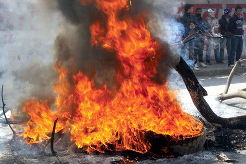 TOXIC CITY: Despite pledging not to burn tyres because the smoke is a health hazard, Nepali Congress activists set off tyre pyres all over the country.