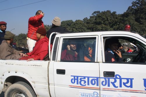 SETTING THE STAGE: Tibetan monks being rounded up by the Valley Police at Gaushala on Saturday morning, ahead of the Chinese premier Wen Jiabao's visit. Over two hundred Tibetans and non-Tibetan monks have been arbitrarily detained from various places in the capital.