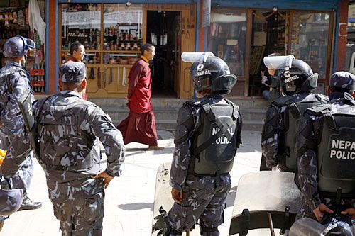 UNDER SURVEILLANCE: Police stand guard at Boudha on Saturday, during Chinese Prime Minister Wen Jibao's five-hour visit. Over 200 Tibetans and non-Tibetans were detained during the visit.