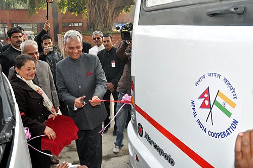 GIFT WRAPPED: Indian Ambassador Jayant Prasad hands over buses and ambulances to Nepali charities on the ocassion of the 63rd Indian Republic Day on Thursday.